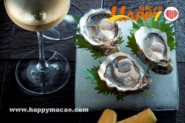 Oyster_with_house_wine_promotion